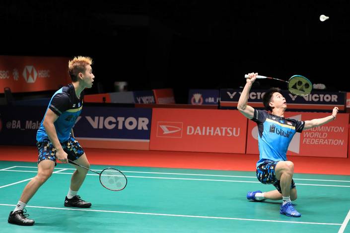 Kevin Sanjaya Sukamuljo/Marcus Fernaldi Gideon mengembalikan shuttlecock. Kevin Sanjaya Sukamuljo/Marcus Fernaldi Gideon mengembalikan shuttlecock.