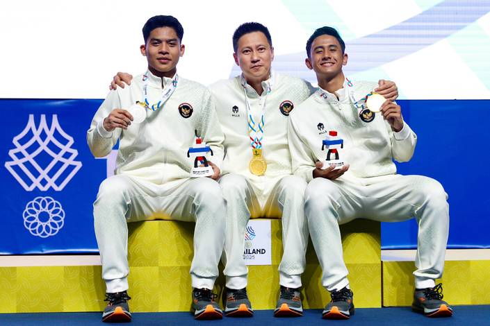 Moh. Zaki Ubaidillah, Indra Wijaya, & Alwi Farhan (Humas PP PBSI)