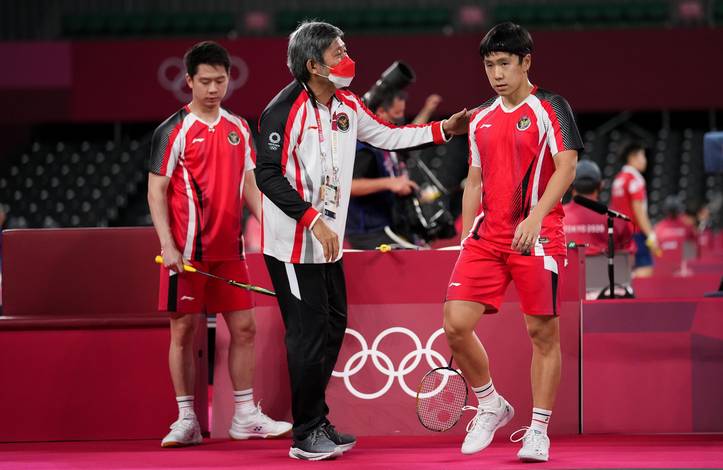 Kepala pelatih ganda putra Indonesia, Herry Iman Pierngadi (tengah) saat memberikan arahan kepada Kevin Sanjaya Sukamuljo/Marcus Fernaldi Gideon. (Foto: BADMINTONPHOTO - Shi Tang) Kepala pelatih ganda putra Indonesia, Herry Iman Pierngadi (tengah) saat memberikan arahan kepada Kevin Sanjaya Sukamuljo/Marcus Fernaldi Gideon. (Foto: BADMINTONPHOTO - Shi Tang)