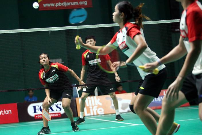 Komang Ayu Cahya Dewi dan Bobby Setiabudi saat bertanding di Liga PB Djarum II (Djarum Badminton) Komang Ayu Cahya Dewi dan Bobby Setiabudi saat bertanding di Liga PB Djarum II (Djarum Badminton)