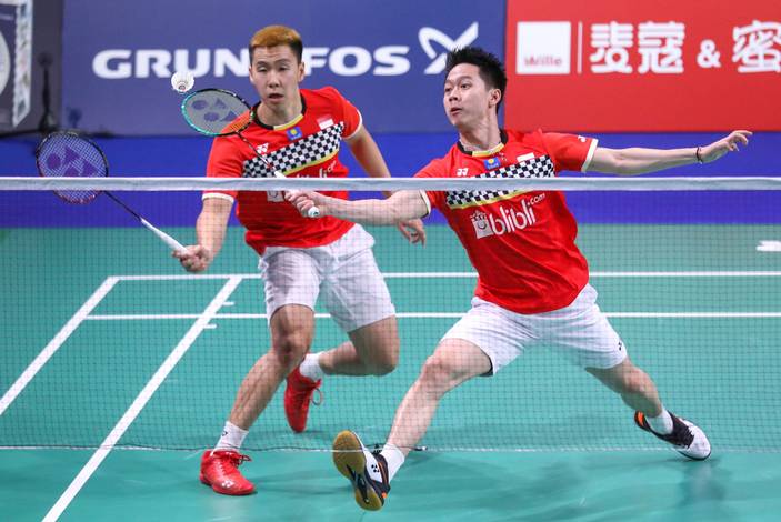 Kevin Sanjaya Sukamuljo/Marcus Fernaldi Gideon (Indonesia) menyambut pengembalian. Kevin Sanjaya Sukamuljo/Marcus Fernaldi Gideon (Indonesia) menyambut pengembalian.